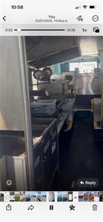 Mobile fish and chip ship with upper deck dining area.